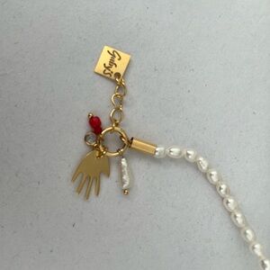 Gold and Pearl Charm Bracelet